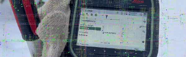 Leica survey controller being operated by a worker wearing gloves, displaying field measurement data, used for expert surveying services for engineering, construction, and energy companies in BC.