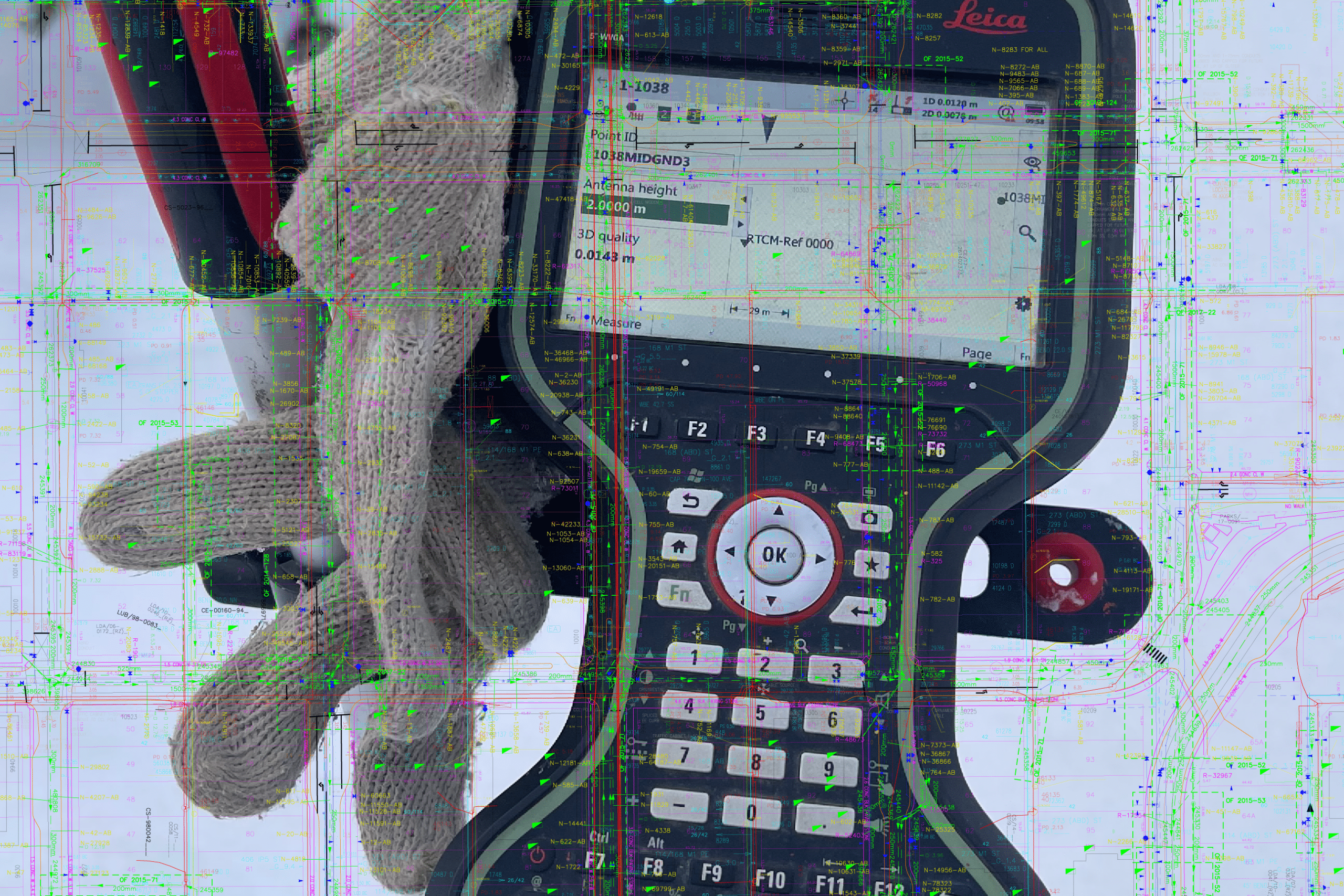 Leica survey controller being operated by a worker wearing gloves, displaying field measurement data, used for expert surveying services for engineering, construction, and energy companies in BC.